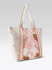 PRIMROSE Woven Beach Tote Bag with Tropical Leaf Embroidery, Peach Pom Pom Trim, Cream and Pink