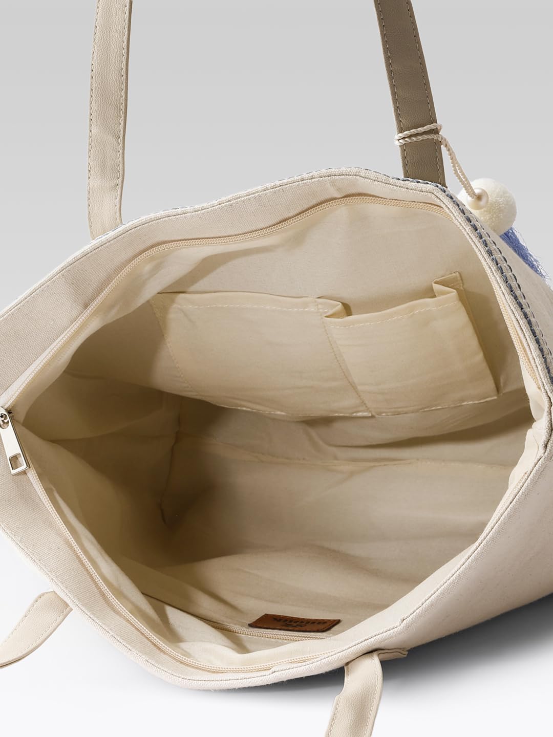 PRIMROSE Embroidered Canvas Tote Bag with Blue Floral Design, Decorative Tassels, Cream Colour