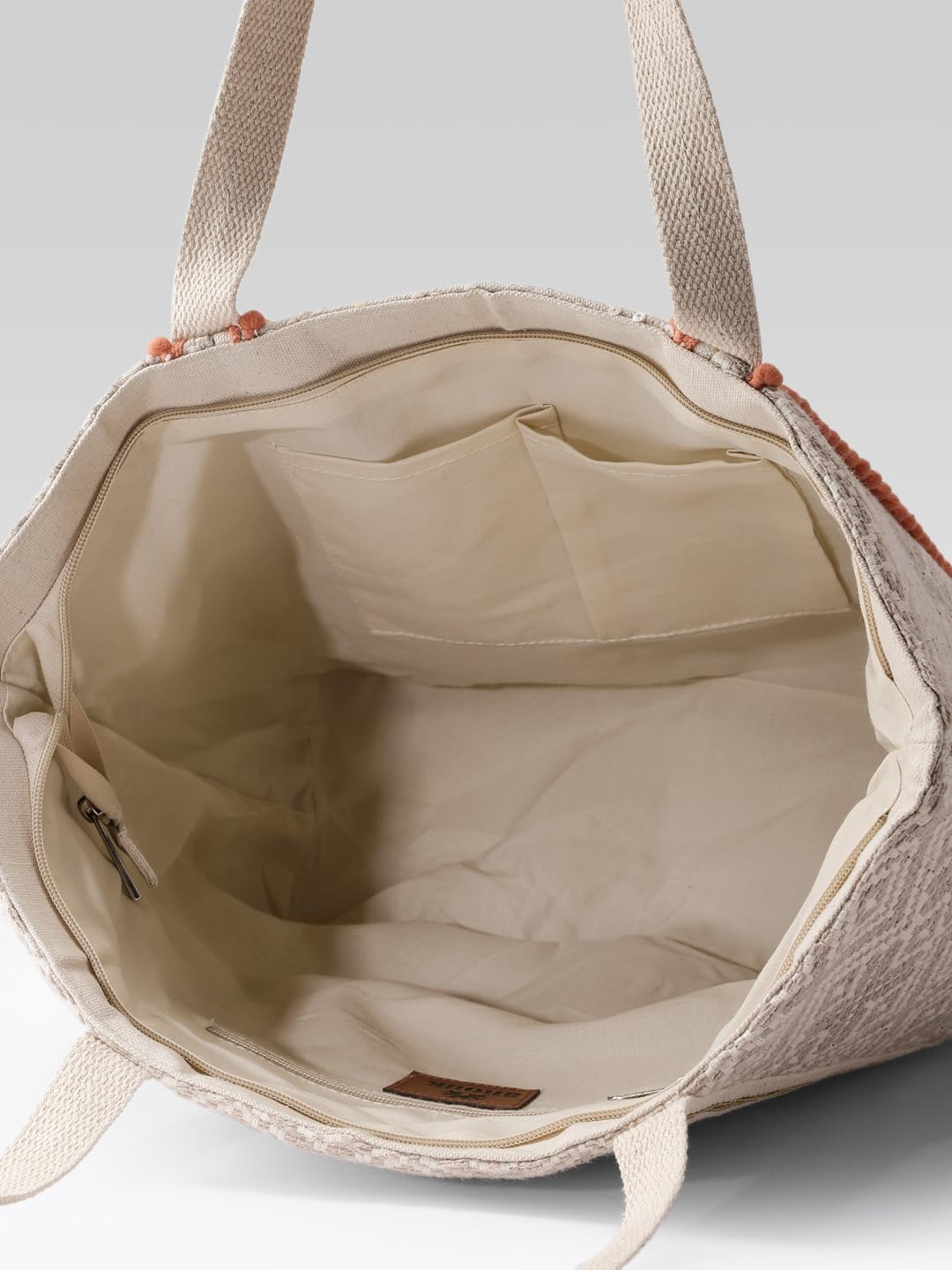 PRIMROSE Woven Beach Tote Bag with Tropical Leaf Embroidery, Peach Pom Pom Trim, Cream and Pink